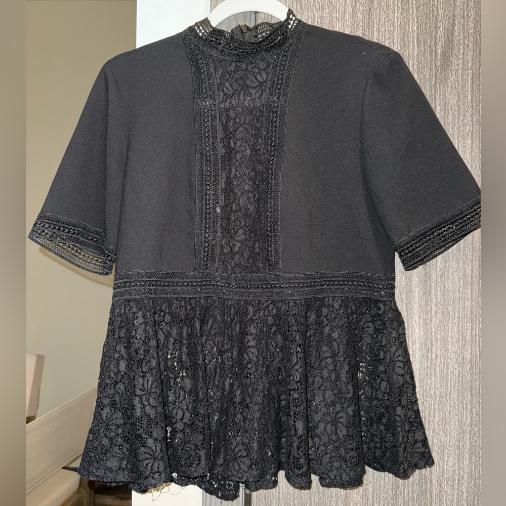 Black laced top.